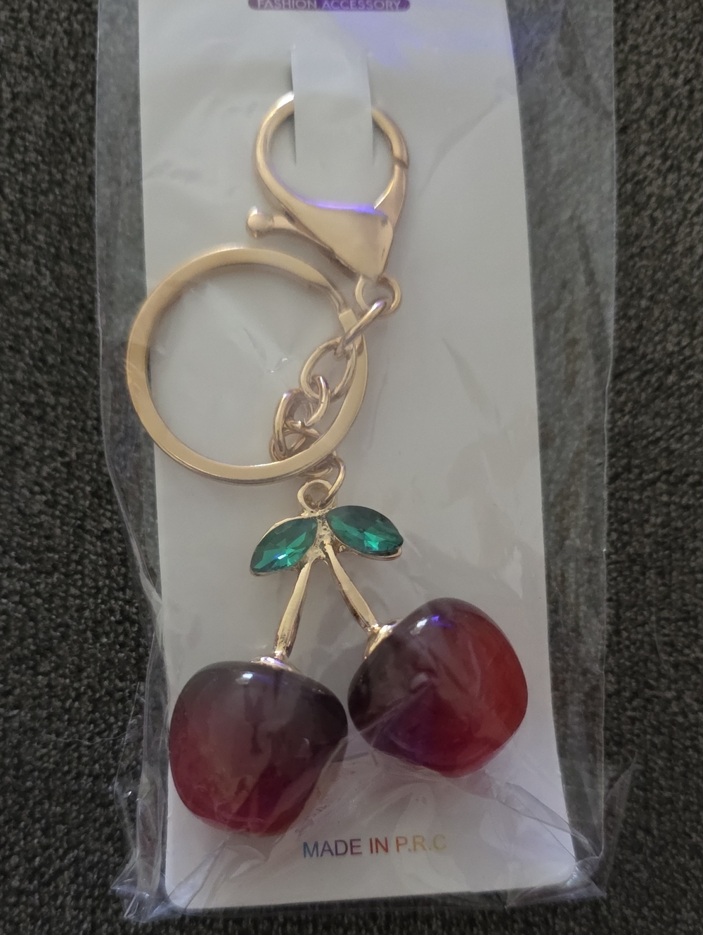 Gold Cherry Keychain with Red Gem Charms and Green Leaf Accents